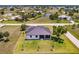 Property showcasing a home with a large backyard at 24194 Peppercorn Rd, Punta Gorda, FL 33955
