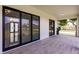 Screened-in patio with outdoor furniture and view of backyard at 24194 Peppercorn Rd, Punta Gorda, FL 33955