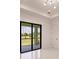 Open concept room with sliding glass doors leading to a patio at 24194 Peppercorn Rd, Punta Gorda, FL 33955