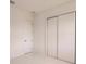 Bright bedroom with white walls and doors at 24194 Peppercorn Rd, Punta Gorda, FL 33955