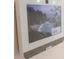 Modern entry system with touchscreen and camera for added security at 25491 Calusa Dr, Punta Gorda, FL 33955
