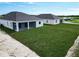 Two-story home with covered patio and spacious backyard at 25491 Calusa Dr, Punta Gorda, FL 33955