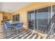 Balcony dining area overlooking ocean view and beach access at 16700 Gulf Blvd # 625, North Redington Beach, FL 33708