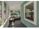 Inviting front porch with seating area, perfect for relaxing at 922 E Ida St, Tampa, FL 33603