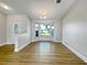 Dining room with bay window and wood-look floors at 865 Everest Rd, Venice, FL 34293