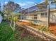 Landscaped backyard with a wooden border and lush greenery at 865 Everest Rd, Venice, FL 34293