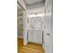Bathroom with white vanity, mirror, and neutral wall at 865 Everest Rd, Venice, FL 34293