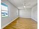 Empty bedroom with light gray walls and wood-look floors at 865 Everest Rd, Venice, FL 34293