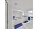 Bathroom featuring double sinks, a bathtub, and a separate shower at 7438 Gulf Way, Hudson, FL 34667