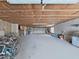 A large open garage space with exposed ceiling insulation at 7438 Gulf Way, Hudson, FL 34667