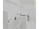 Clean laundry room with a utility sink, washer and dryer, and shelving at 7438 Gulf Way, Hudson, FL 34667