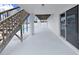 Covered patio with a view of the pool area and access to the backyard and living area, ideal for seamless indoor-outdoor living at 7438 Gulf Way, Hudson, FL 34667