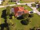 Aerial view of house showcasing solar panels at 1 Long Meadow Ln, Rotonda West, FL 33947