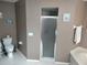 Bathroom with shower, toilet, and bathtub at 1 Long Meadow Ln, Rotonda West, FL 33947
