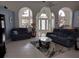 Open living space featuring vaulted ceilings and neutral decor at 1 Long Meadow Ln, Rotonda West, FL 33947