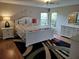 Main bedroom with king-size bed, nightstands and dresser at 1 Long Meadow Ln, Rotonda West, FL 33947