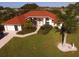 Single-Gathering home with red tile roof and large backyard at 1 Long Meadow Ln, Rotonda West, FL 33947
