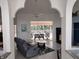 Spacious living room with sliding doors opening to pool area at 1 Long Meadow Ln, Rotonda West, FL 33947