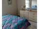 Guest bedroom with double bed and dresser at 1 Long Meadow Ln, Rotonda West, FL 33947