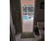Bathroom with toilet and view of the pool and spa at 1 Long Meadow Ln, Rotonda West, FL 33947