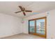 Bedroom with water views and sliding glass doors to balcony at 12550 Capri N Cir, Treasure Island, FL 33706