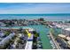 Aerial view showcasing the property's location near the marina and waterfront at 12550 Capri N Cir, Treasure Island, FL 33706