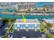Aerial view of three-unit building near marina at 12550 Capri N Cir, Treasure Island, FL 33706