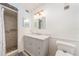 Updated bathroom with a vanity and shower at 12550 Capri N Cir, Treasure Island, FL 33706