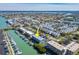 Bird's eye view highlighting the property's waterfront location and nearby amenities at 12550 Capri N Cir, Treasure Island, FL 33706