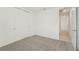 Bright bedroom with grey carpet and double door closet at 14074 Ginnie Springs Way, Parrish, FL 34219