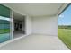 Covered patio with view of backyard and waterway at 14074 Ginnie Springs Way, Parrish, FL 34219