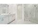 Modern bathroom featuring double vanity and a glass shower at 14074 Ginnie Springs Way, Parrish, FL 34219