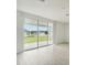 Sliding glass doors to backyard patio at 14074 Ginnie Springs Way, Parrish, FL 34219