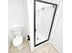 Clean bathroom with a frameless shower and vinyl flooring at 1200 Tarpon Woods Blvd # S2, Palm Harbor, FL 34685