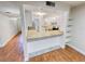 Open kitchen with granite countertops and a breakfast bar at 1200 Tarpon Woods Blvd # S2, Palm Harbor, FL 34685