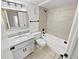 Updated bathroom with new vanity, bathtub, and tile at 1200 Tarpon Woods Blvd # S2, Palm Harbor, FL 34685