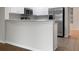 Kitchen island with stainless steel appliances at 8928 Red Beechwood Ct, Riverview, FL 33578