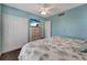 Calm bedroom with large closet, featuring a beach-themed TV and a comfortable bed at 7442 Palm Island Dr # 3624, Placida, FL 33946