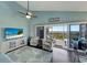 Bright and airy living area with beach decor, opens to a cozy porch with ocean views at 7442 Palm Island Dr # 3624, Placida, FL 33946