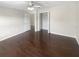 Spacious bedroom featuring wood flooring and a fan at 30208 Rattana Ct, Wesley Chapel, FL 33545