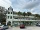 Green building exterior with parking at 2386 Sumatran Way # 26, Clearwater, FL 33763