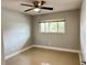 Bright bedroom with tile floors and ceiling fan at 2386 Sumatran Way # 26, Clearwater, FL 33763
