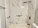 Updated bathroom with marble tile and modern fixtures at 2386 Sumatran Way # 26, Clearwater, FL 33763