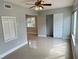 Spacious bedroom with tile floors and ceiling fan at 2386 Sumatran Way # 26, Clearwater, FL 33763