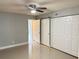 Spacious bedroom with ample closet space and sliding barn doors at 2386 Sumatran Way # 26, Clearwater, FL 33763