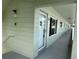 Exterior view of building showing walkway and entrance at 2386 Sumatran Way # 26, Clearwater, FL 33763