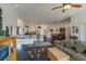 Open concept living area with a view into the kitchen at 37600 Largo Ln, Dade City, FL 33523