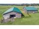 Aerial view of barn and surrounding pastures at 37600 Largo Ln, Dade City, FL 33523