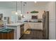 Modern kitchen with stainless steel appliances and an island at 37600 Largo Ln, Dade City, FL 33523