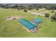 Aerial view of farm with barn and horse ring at 37600 Largo Ln, Dade City, FL 33523